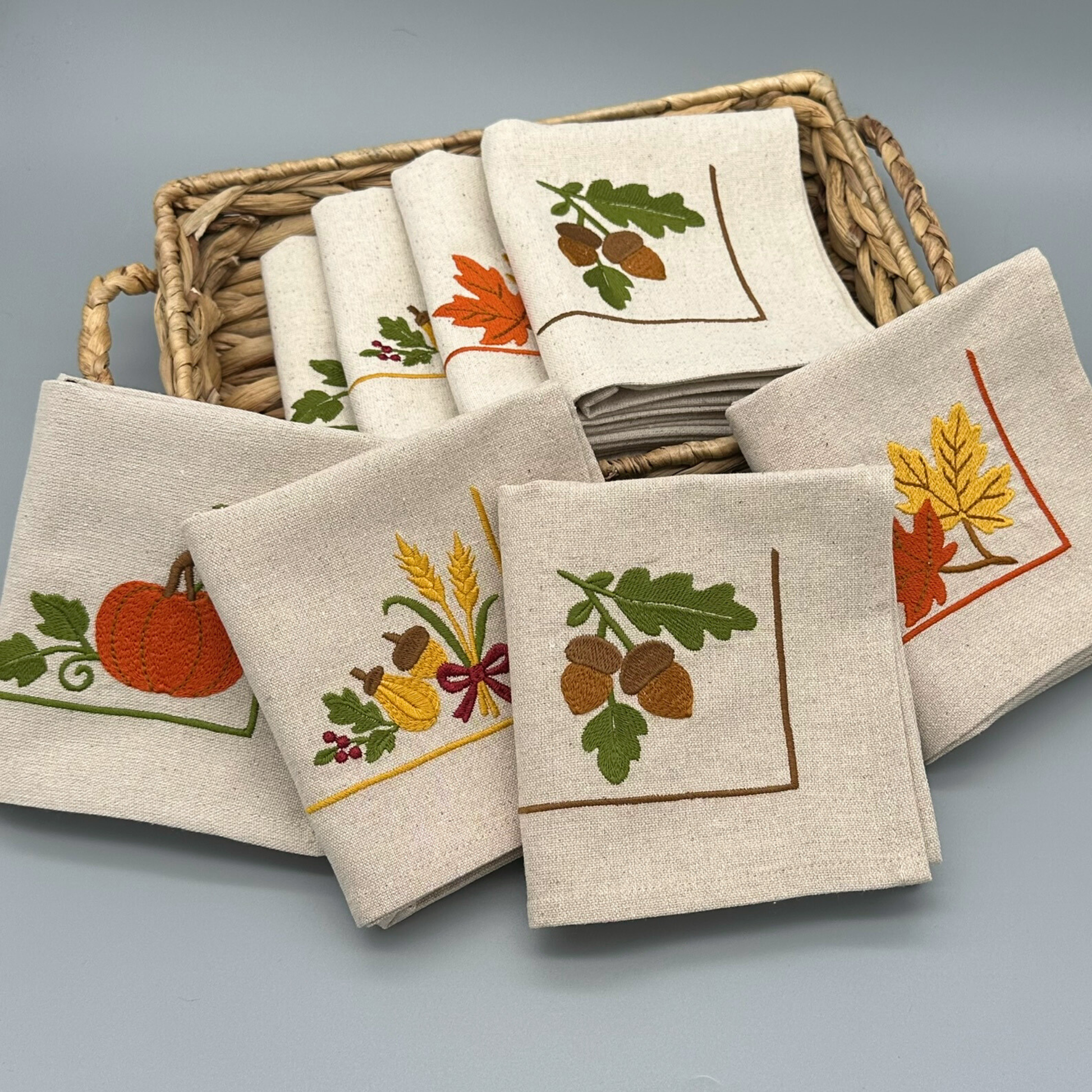 Set of embroidered napkins with autumn designs 